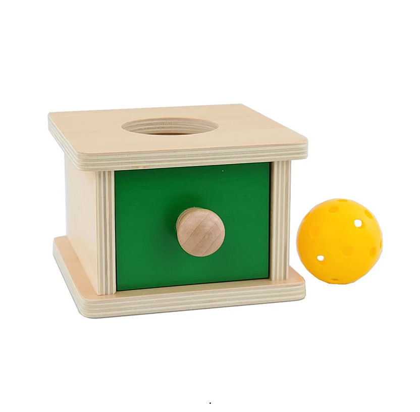 Box with drawer and ball